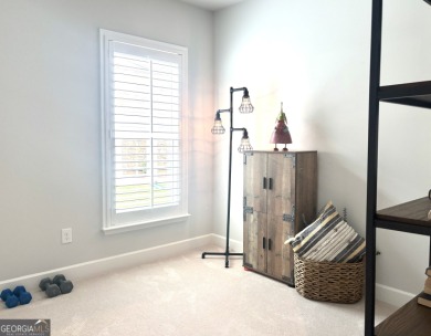 Imagine starting your mornings with coffee on a covered lanai on Canongate Golf At Sun City Peachtree in Georgia - for sale on GolfHomes.com, golf home, golf lot