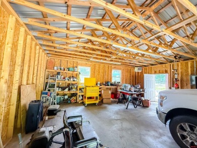 Just steps from the White River, this custom-built 2-bedroom on Rivercliff Golf Course in Arkansas - for sale on GolfHomes.com, golf home, golf lot
