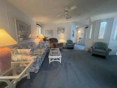 NEW REDUCED PRICE ~ $89,900! Located adjacent to a Florida on Four Lakes Golf Club in Florida - for sale on GolfHomes.com, golf home, golf lot