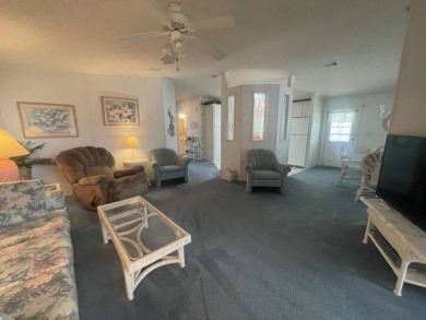 NEW REDUCED PRICE ~ $89,900! Located adjacent to a Florida on Four Lakes Golf Club in Florida - for sale on GolfHomes.com, golf home, golf lot