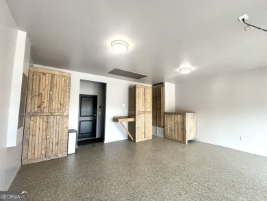 Imagine starting your mornings with coffee on a covered lanai on Canongate Golf At Sun City Peachtree in Georgia - for sale on GolfHomes.com, golf home, golf lot