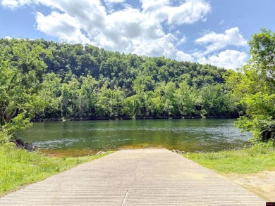 Just steps from the White River, this custom-built 2-bedroom on Rivercliff Golf Course in Arkansas - for sale on GolfHomes.com, golf home, golf lot