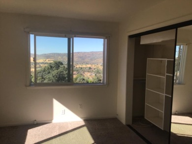 Beautiful home with massive wall of glass to take in the views on The Club at Copper Valley Golf Course in California - for sale on GolfHomes.com, golf home, golf lot