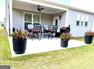 Imagine starting your mornings with coffee on a covered lanai on Canongate Golf At Sun City Peachtree in Georgia - for sale on GolfHomes.com, golf home, golf lot