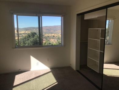 Beautiful home with massive wall of glass to take in the views on The Club at Copper Valley Golf Course in California - for sale on GolfHomes.com, golf home, golf lot