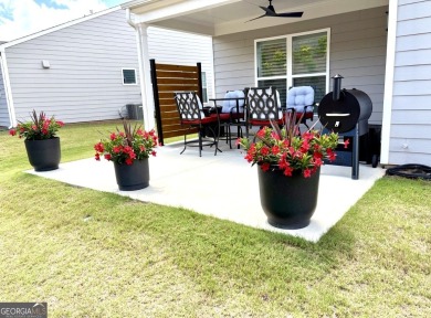 Imagine starting your mornings with coffee on a covered lanai on Canongate Golf At Sun City Peachtree in Georgia - for sale on GolfHomes.com, golf home, golf lot