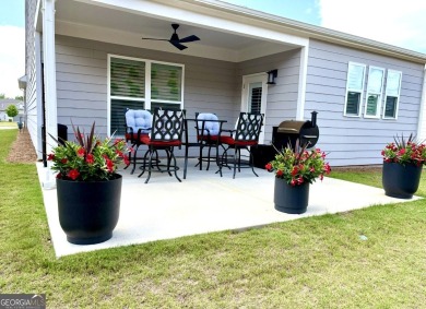 Imagine starting your mornings with coffee on a covered lanai on Canongate Golf At Sun City Peachtree in Georgia - for sale on GolfHomes.com, golf home, golf lot