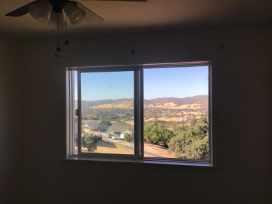 Beautiful home with massive wall of glass to take in the views on The Club at Copper Valley Golf Course in California - for sale on GolfHomes.com, golf home, golf lot
