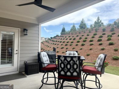 Imagine starting your mornings with coffee on a covered lanai on Canongate Golf At Sun City Peachtree in Georgia - for sale on GolfHomes.com, golf home, golf lot