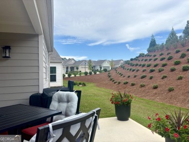 Imagine starting your mornings with coffee on a covered lanai on Canongate Golf At Sun City Peachtree in Georgia - for sale on GolfHomes.com, golf home, golf lot