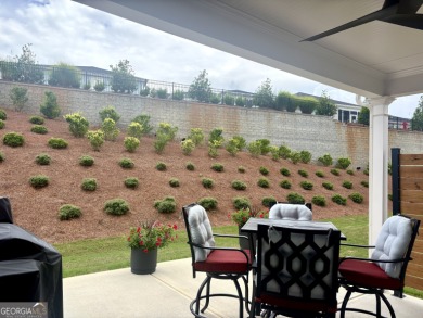 Imagine starting your mornings with coffee on a covered lanai on Canongate Golf At Sun City Peachtree in Georgia - for sale on GolfHomes.com, golf home, golf lot