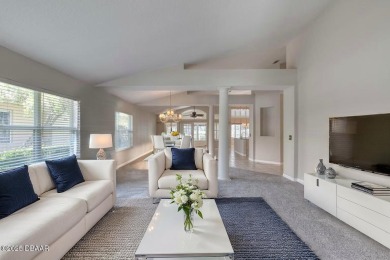 Welcome home to this beautifully maintained 3-bedroom on Plantation Bay Golf and Country Club in Florida - for sale on GolfHomes.com, golf home, golf lot