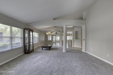 Welcome home to this beautifully maintained 3-bedroom on Plantation Bay Golf and Country Club in Florida - for sale on GolfHomes.com, golf home, golf lot