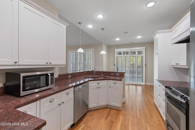 Step into easy living with this charming one-level home on Members Club At St. James Plantation in North Carolina - for sale on GolfHomes.com, golf home, golf lot