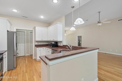 Step into easy living with this charming one-level home on Members Club At St. James Plantation in North Carolina - for sale on GolfHomes.com, golf home, golf lot