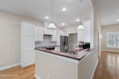 Step into easy living with this charming one-level home on Members Club At St. James Plantation in North Carolina - for sale on GolfHomes.com, golf home, golf lot