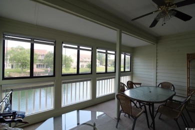 This top floor, end unit, 2BR/2BA condominium at Island Green on Island Green Golf Club in South Carolina - for sale on GolfHomes.com, golf home, golf lot