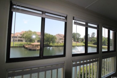 This top floor, end unit, 2BR/2BA condominium at Island Green on Island Green Golf Club in South Carolina - for sale on GolfHomes.com, golf home, golf lot