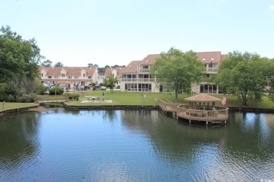 This top floor, end unit, 2BR/2BA condominium at Island Green on Island Green Golf Club in South Carolina - for sale on GolfHomes.com, golf home, golf lot