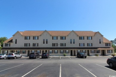 This top floor, end unit, 2BR/2BA condominium at Island Green on Island Green Golf Club in South Carolina - for sale on GolfHomes.com, golf home, golf lot