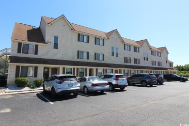 This top floor, end unit, 2BR/2BA condominium at Island Green on Island Green Golf Club in South Carolina - for sale on GolfHomes.com, golf home, golf lot