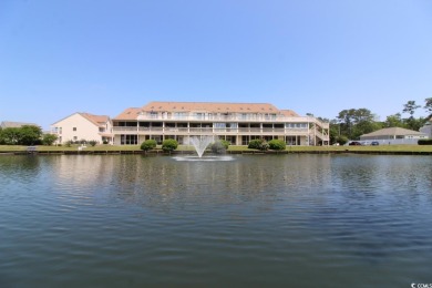 This top floor, end unit, 2BR/2BA condominium at Island Green on Island Green Golf Club in South Carolina - for sale on GolfHomes.com, golf home, golf lot