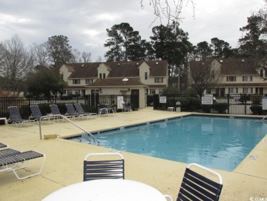 This top floor, end unit, 2BR/2BA condominium at Island Green on Island Green Golf Club in South Carolina - for sale on GolfHomes.com, golf home, golf lot