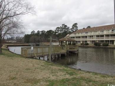 This top floor, end unit, 2BR/2BA condominium at Island Green on Island Green Golf Club in South Carolina - for sale on GolfHomes.com, golf home, golf lot