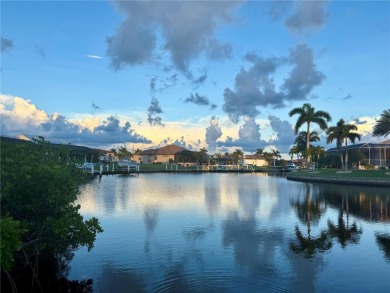 One or more photo(s) has been virtually staged. WATERFRONT on Saint Andrews South Golf Club in Florida - for sale on GolfHomes.com, golf home, golf lot