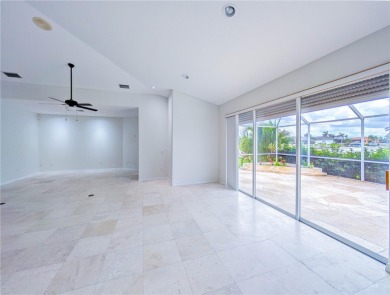One or more photo(s) has been virtually staged. WATERFRONT on Saint Andrews South Golf Club in Florida - for sale on GolfHomes.com, golf home, golf lot