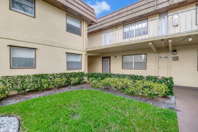 Beautiful well-kept ground floor garden view 2 bed/ 2 bath unit on Addison Reserve in Florida - for sale on GolfHomes.com, golf home, golf lot