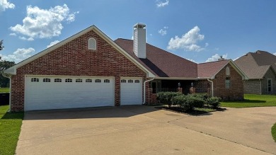This exceptionally-updated 3 bedroom, 3 bathroom brick home in on Cedar Creek Country Club in Texas - for sale on GolfHomes.com, golf home, golf lot