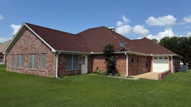 This exceptionally-updated 3 bedroom, 3 bathroom brick home in on Cedar Creek Country Club in Texas - for sale on GolfHomes.com, golf home, golf lot
