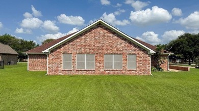 This exceptionally-updated 3 bedroom, 3 bathroom brick home in on Cedar Creek Country Club in Texas - for sale on GolfHomes.com, golf home, golf lot