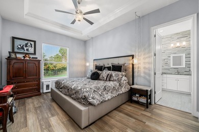 Welcome to this modern 3-bed, 2-bath CBS home in desirable Sun on Sun n Lake Golf and Country Club in Florida - for sale on GolfHomes.com, golf home, golf lot