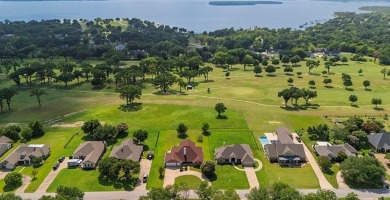 This exceptionally-updated 3 bedroom, 3 bathroom brick home in on Cedar Creek Country Club in Texas - for sale on GolfHomes.com, golf home, golf lot