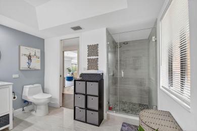 Welcome to this stunning home that blends modern elegance with on Fountains Golf and Country Club in Florida - for sale on GolfHomes.com, golf home, golf lot