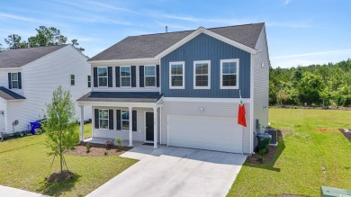 Welcome to 1102 Boswell Court -- a stunning home nestled in the on Wild Wing Plantation in South Carolina - for sale on GolfHomes.com, golf home, golf lot