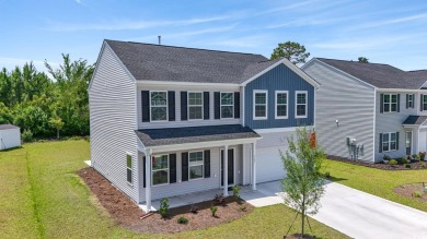 Welcome to 1102 Boswell Court -- a stunning home nestled in the on Wild Wing Plantation in South Carolina - for sale on GolfHomes.com, golf home, golf lot