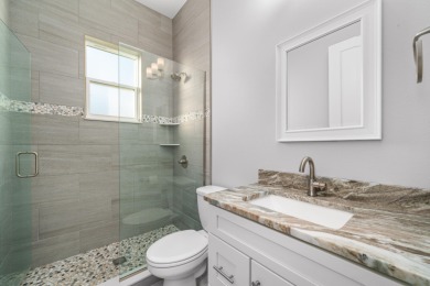 Welcome to this modern 3-bed, 2-bath CBS home in desirable Sun on Sun n Lake Golf and Country Club in Florida - for sale on GolfHomes.com, golf home, golf lot