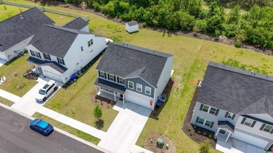 Welcome to 1102 Boswell Court -- a stunning home nestled in the on Wild Wing Plantation in South Carolina - for sale on GolfHomes.com, golf home, golf lot