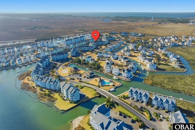 Welcome to 315 Pirates Way! Located in Building Three of on Nags Head Golf Links in North Carolina - for sale on GolfHomes.com, golf home, golf lot