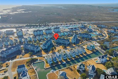 Welcome to 315 Pirates Way! Located in Building Three of on Nags Head Golf Links in North Carolina - for sale on GolfHomes.com, golf home, golf lot