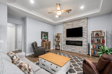 Welcome to this modern 3-bed, 2-bath CBS home in desirable Sun on Sun n Lake Golf and Country Club in Florida - for sale on GolfHomes.com, golf home, golf lot