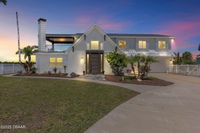 Experience the best of Florida living in this stunning two-story on Ocean Palm Golf Course in Florida - for sale on GolfHomes.com, golf home, golf lot