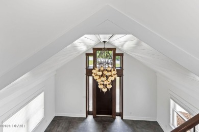 Experience the best of Florida living in this stunning two-story on Ocean Palm Golf Course in Florida - for sale on GolfHomes.com, golf home, golf lot