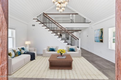 Experience the best of Florida living in this stunning two-story on Ocean Palm Golf Course in Florida - for sale on GolfHomes.com, golf home, golf lot