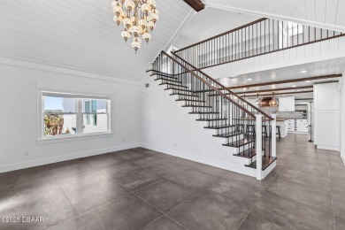 Experience the best of Florida living in this stunning two-story on Ocean Palm Golf Course in Florida - for sale on GolfHomes.com, golf home, golf lot