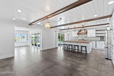 Experience the best of Florida living in this stunning two-story on Ocean Palm Golf Course in Florida - for sale on GolfHomes.com, golf home, golf lot
