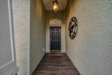 Welcome to this modern 3-bed, 2-bath CBS home in desirable Sun on Sun n Lake Golf and Country Club in Florida - for sale on GolfHomes.com, golf home, golf lot